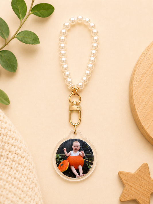 Personalised baby photo keychain with pearl wristlet featuring a custom baby photo, a thoughtful keepsake gift by Little Snapshot Co.