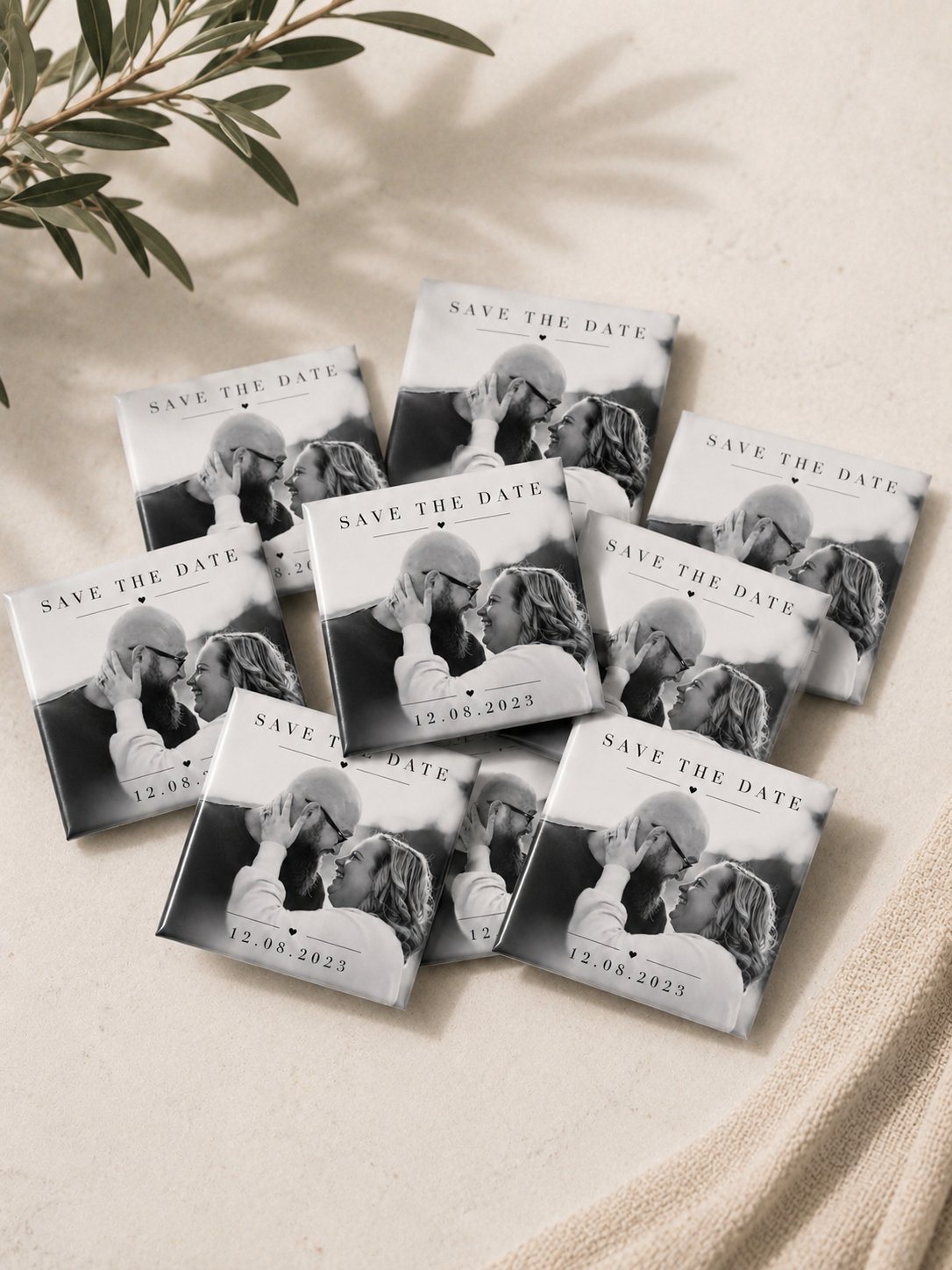 Bulk personalised save the date photo magnets featuring a black and white couple photo, designed as wedding announcement keepsakes for guests in Australia.